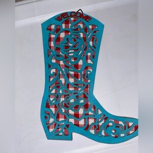 This item is a Pioneer Woman Welcome Cowboy Boot Wall Decor